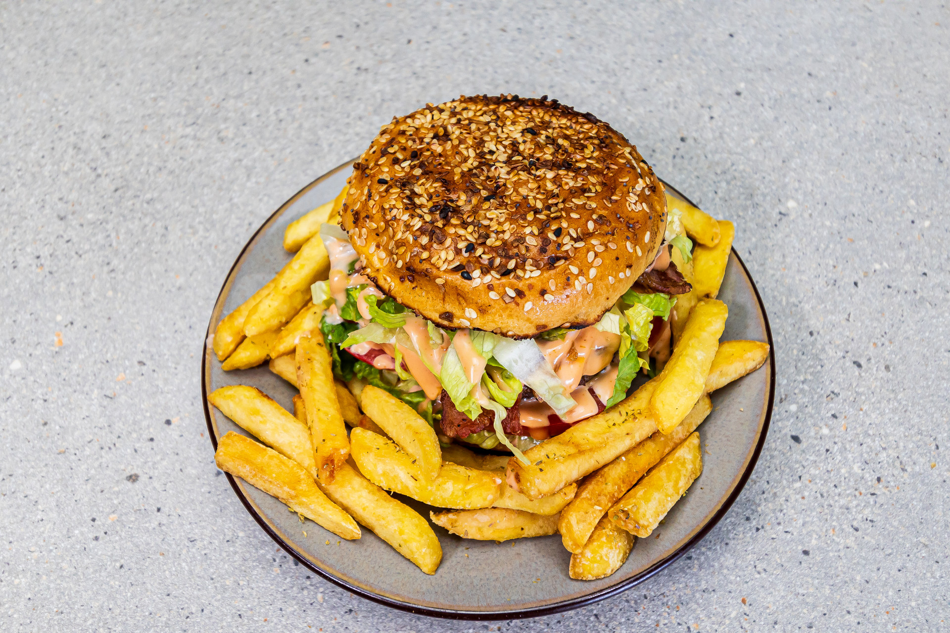 Homemade beef burger with bacon, cheese, tomato, lettuce and french fries – Cristina's Greek Souvlaki Daventry